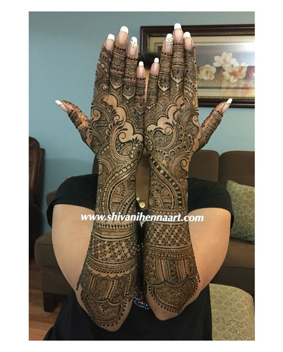 Unique Hook Art Blending Into Stylish Full Hand Mehndi Design Unique Hook Art Blending Into Stylish Full Hand Mehndi Design